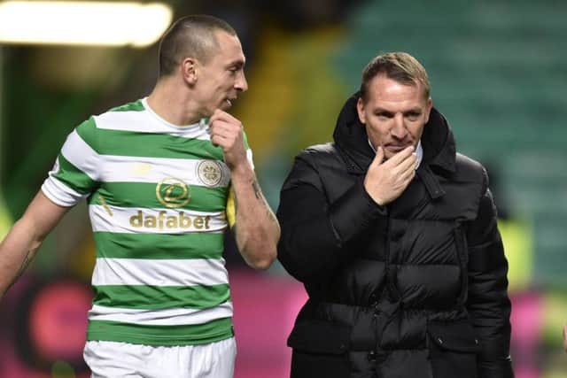 Celtic captain Scott Brown with his manager Brendan Rodgers. Picture: SNS