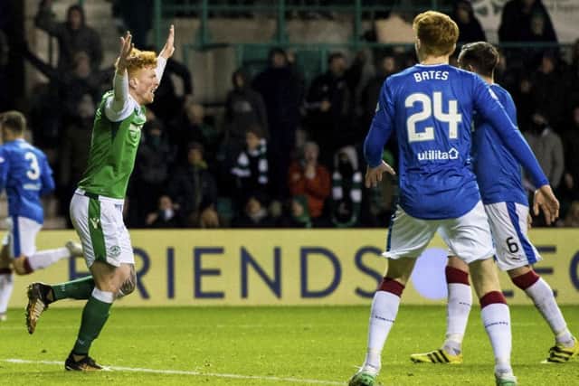 Simon Murray appeals to the referee after the ball appeared to hit the arm of David Bates (right) in the penalty area. Picture: SNS