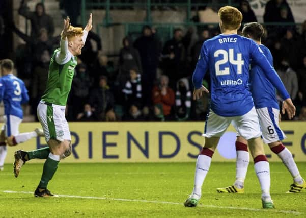 Simon Murray appeals to the referee after the ball appeared to hit the arm of David Bates (right) in the penalty area. Picture: SNS