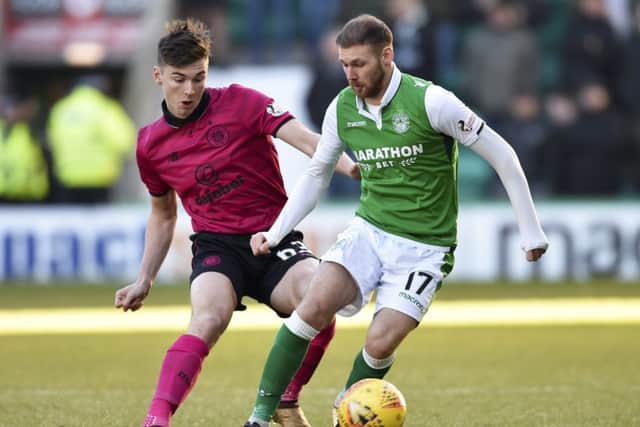 Martin Boyle, right, has stepped it up a gear since Hibs have won promotion. Picture: SNS