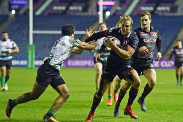 Edinburgh's Duhan van der Merwe runs through to score his late try. Picture: Paul Devlin/SNS