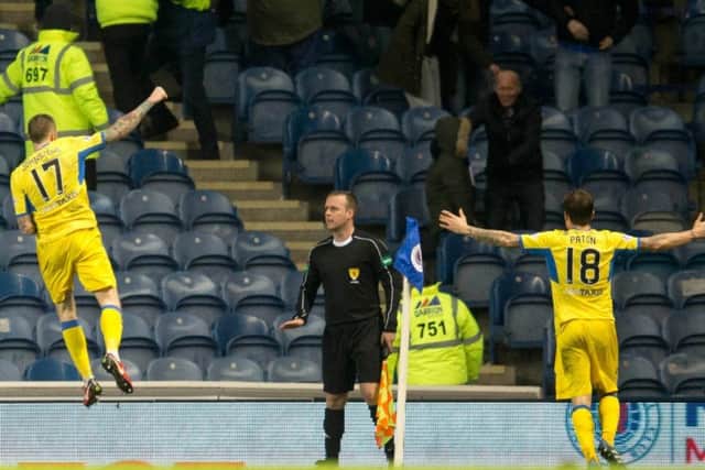 St Johnstone Denny Johnstone (left) celebrates scoring his side's second goal against Rangers. Picture: Jeff Holmes/PA Wire