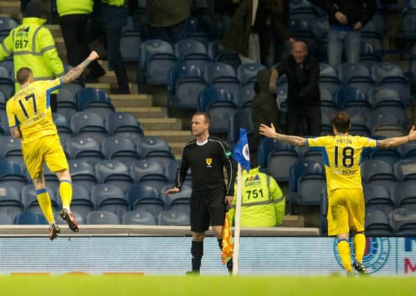 St Johnstone Denny Johnstone (left) celebrates scoring his side's second goal against Rangers. Picture: Jeff Holmes/PA Wire
