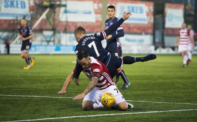 Hamilton's Dougie Imrie is fouled in the box by Michael Gardyne. Picture: SNS/Bill Murray