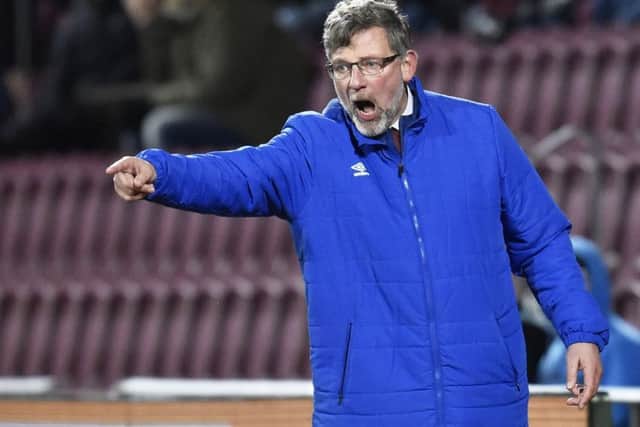 Craig Levein in front of the new main stand at Tynecastle. Picture: Rob Casey/SNS
