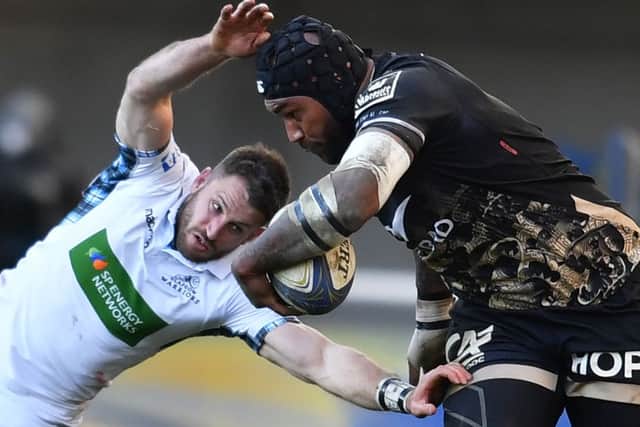 Montpellier's Fijian winger Nemani Nadolo, right, vies with Glasgow's Scottish wing Tommy Seymour. Picture: AFP/Getty Images