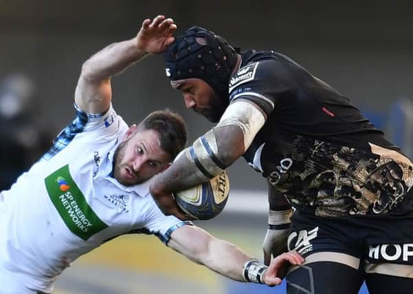 Montpellier's Fijian winger Nemani Nadolo, right, vies with Glasgow's Scottish wing Tommy Seymour. Picture: AFP/Getty Images