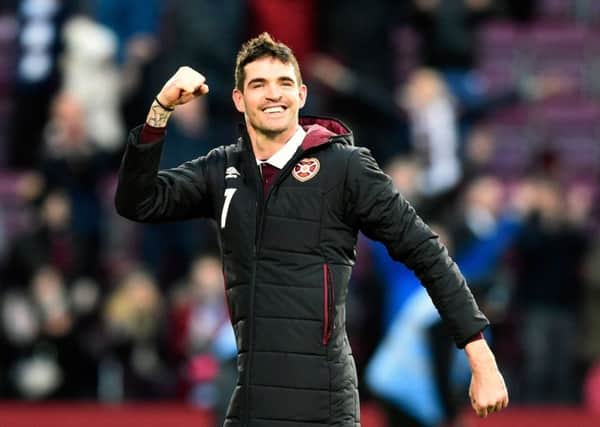 Hearts striker Kyle Lafferty celebrates after the final whistle. Picture: Ian Rutherford/PA
