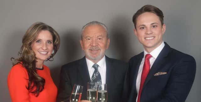 Lord Sugar (centre) with James White and Sarah Lynn. Picture: Yui Mok/PA Wire