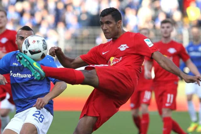 Marvin Compper clears the ball as Darmstadt forward Aenis Ben-Hatira waits to pounce. Picture: Getty Images