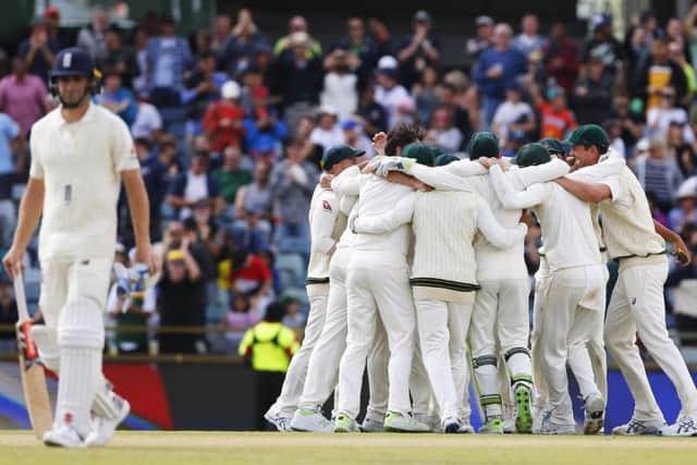 Australia celebrate the final wicket of Chris Woakes in the third Test to win the Ashes. Picture: Jason O'Brien/PA Wire
