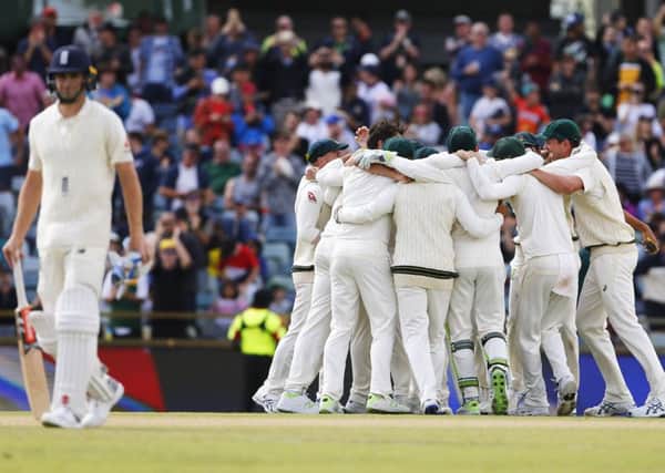 Australia celebrate the final wicket of Chris Woakes in the third Test to win the Ashes. Picture: Jason O'Brien/PA Wire