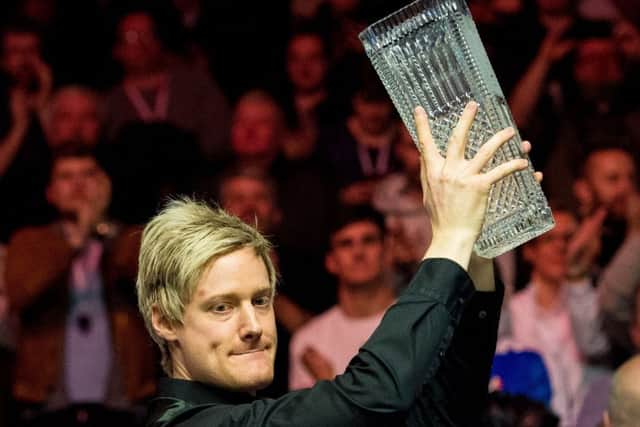 Neil Robertson holds aloft The Stephen Hendry trophy. Picture: Ross Parker/SNS
