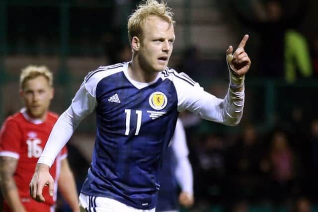 Steven Naismith celebrates a goal for Scotland in March 2017. The Norwich City forward is hopeful of a national team recall. Picture: Picture: PA