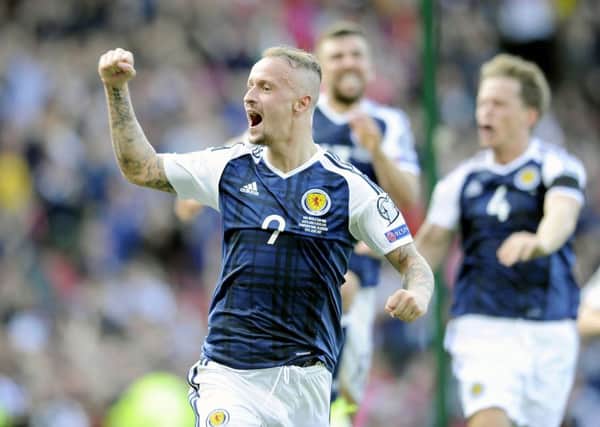 Leigh Griffiths scored a stunning free kick double for Scotland against England, taking the Scots close to a famous victory. Picture: Michael Gillen