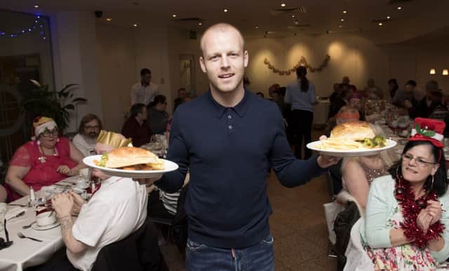 Scotland international Steven Naismith teamed up with Glasgow charity Loaves and Fishes, an organisation that helps the city's homeless and operates a food bank. Picture: Gary Hutchison/SNS