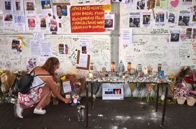 Tributes being paid to the victims. Picture: NIKLAS HALLE'N/AFP/Getty Images)