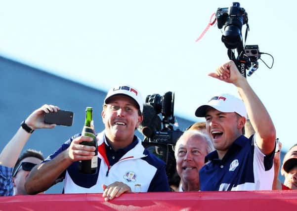 Phil Mickelson and Jordan Spieth celebrate the United States' Ryder Cup triumph at Hazeltine in 2016. Picture: Andrew Redington/Getty Images
