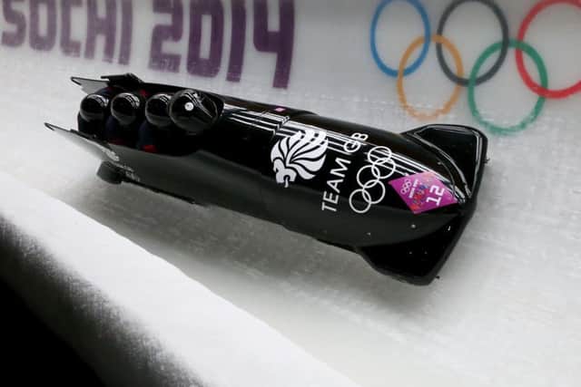John Jackson, Stuart Benson, Bruce Tasker and Joel Fearon of Great Britain 1 make a run during the 2014 Sochi Winter Olympics. Picture: Julian Finney/Getty Images