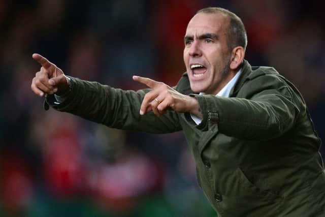 Paolo Di Canio shouts instructions from the touchline during his time as Swindon Town boss. Picture: Getty Images