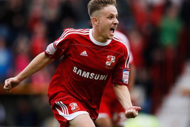 Simon Ferry celebrates a goal for Swindon. Picture: Getty Images