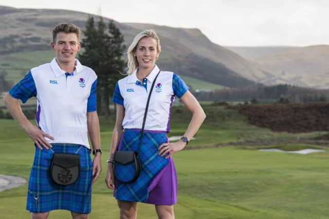 Athletes Andrew Butchart and Lynsey Sharp model the Team Scotland parade uniform for next year's Commonwealth Games
opening ceremony. The outfits were designed by Siobhan Mackenzie and created by tartan manufacturers House of Edgar. Picture: Alistair Devine