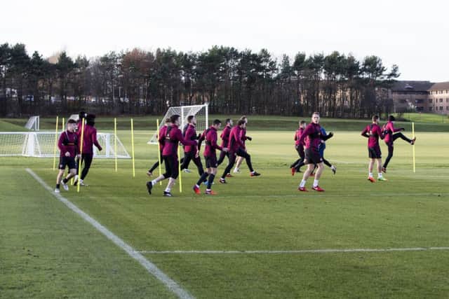 The Hearts players are put through their paces at the Oriam ahead of the trip to face St Johnstone. Picture: SNS Group