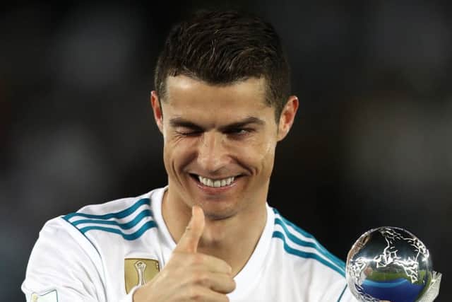 Cristiano Ronaldo with the Golden Ball trophy after Real Madrid's victory in the Club World Cup final against Gremio. Picture: Francois Nel/Getty Images