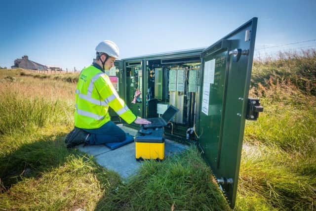 An Openreach engineer works on an exchange in North Tolsta, 
in the east of the Isle of Lewis. Picture: Iain MacDonald/PA