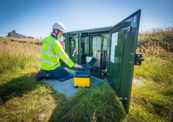 An Openreach engineer works on an exchange in North Tolsta,
in the east of the Isle of Lewis. Picture: Iain MacDonald/PA
