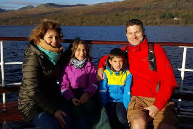 Anthony and Sacha Whiteside and their children Laila and Miles on a boat trip on Loch Katrine
