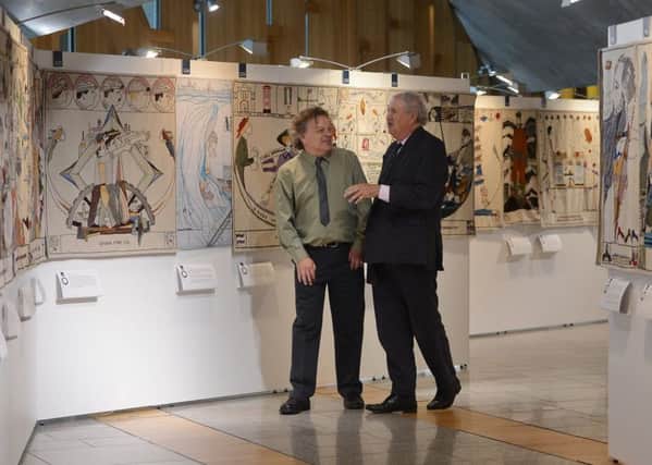 Author Alexander McCall Smith and Artist Andrew Crummy walk through some of the 160 panels.

Pic Neil Hanna