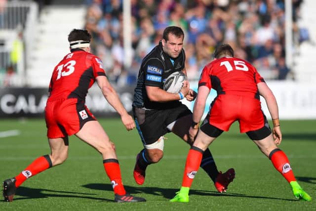 Action from the last 1872 Cup clash as Fraser Brown faces up to Chris Dean and Glenn Bryce of Edinburgh. Picture: SNS Group