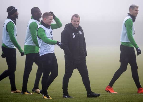 Manager Brendan Rodgers with the Celtic players at a misty Lennoxtown. Picture: Craig Williamson/SNS