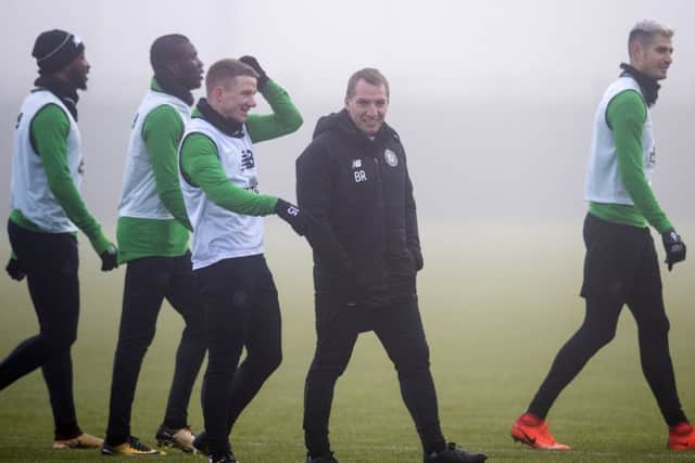 Manager Brendan Rodgers with the Celtic players at a misty Lennoxtown. Picture: Craig Williamson/SNS