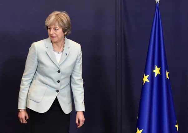 Theresa May has cut a sorry figure on the international stage as well as at home. Picture: John Thys/Getty