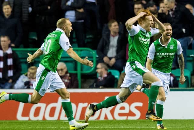 Simon Murray celebrates his goal for Hibs against Hearts in October. Picture: Ross Parker/SNS