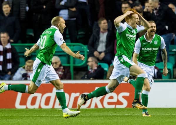 Simon Murray celebrates his goal for Hibs against Hearts in October. Picture: Ross Parker/SNS