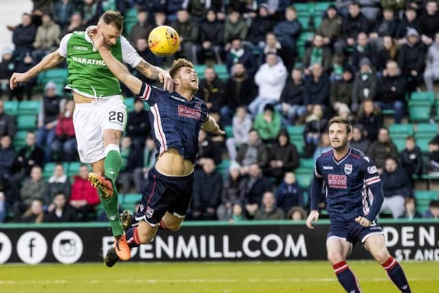 Hibernian's Anthony Stokes rises to scores with a header. Picture: SNS/Alan Rennie