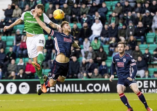 Hibernian's Anthony Stokes rises to scores with a header. Picture: SNS/Alan Rennie