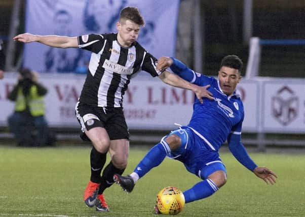 St Mirren's Cammy Smith and QOTS' Callum Tapping. Picture: SNS/Garry Williamson