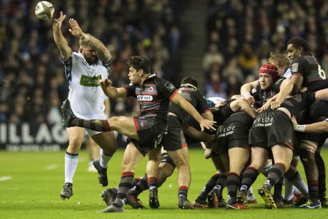 Glasgow Warriors' Jamie Bhatti (left) attempts to block Sam Hidalgo-Clyne's kick. Picture: SNS/Ross Parker