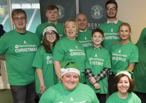 Volunteers helping at Hibs' Christmas lunch. Picture: Ian Rutherford