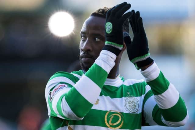 Celtic's Moussa Dembele acknowledges the fans at the end of the 2-0 Boxing Day win over Dundee at Dens Park. Picture: Craig Williamson/SNS