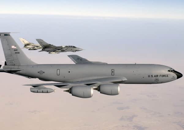A US Air Force  KC-135R Stratotanker in action refuelling a fighter jet. Picture: Creative Commons