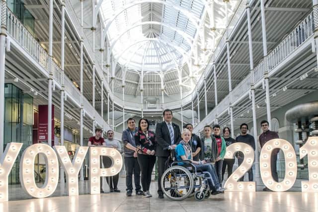 Mark McDonald, predecessor of Maree Todd, with young people at a launch event at the National Museum of Scotland.