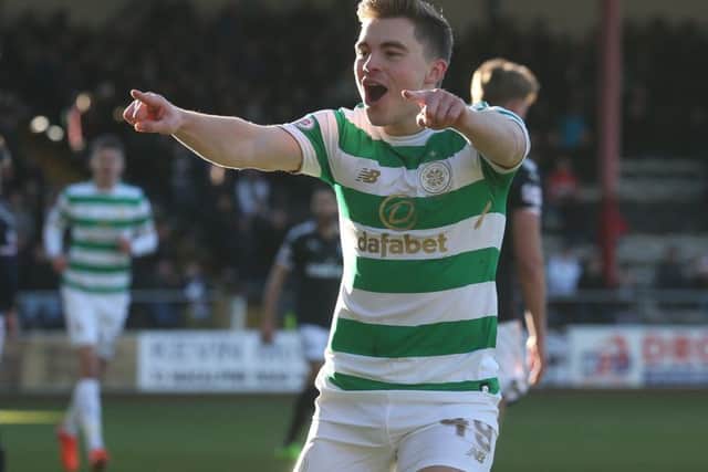 Celtic's James Forrest celebrates scoring his side's first goal against Dundee. Picture: Andrew Milligan/PA Wire