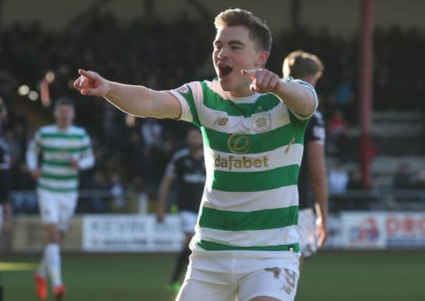 Celtic's James Forrest celebrates scoring his side's first goal against Dundee. Picture: Andrew Milligan/PA Wire