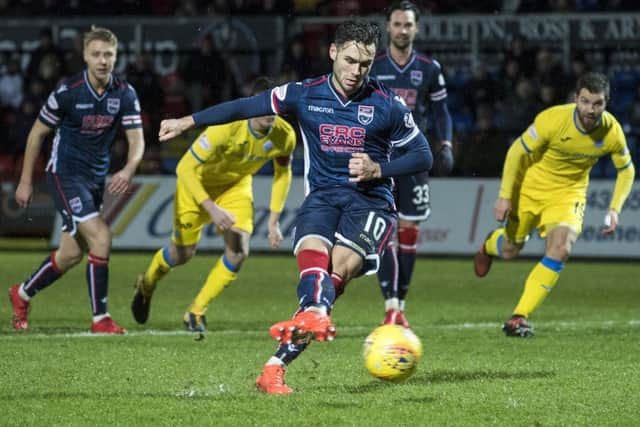 Ross County's Alex Schalk equalises from the spot.
