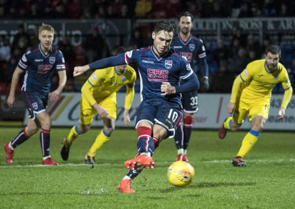 Ross County's Alex Schalk equalises from the spot.